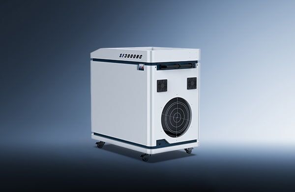 A white, box-shaped industrial air purifier with a large circular front vent, small wheels for mobility, and the label "דגם HC 1500-3000" on top, set against a gradient blue background.
