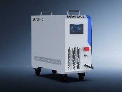 A white industrial machine labeled דגם HC 500-1000 with vents, buttons, and casters, set against a gradient blue background.