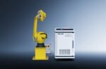 A דגם RC Series אנכי robotic arm in yellow stands beside a white SENFENG machine against a gradient blue-gray background, showcasing a clean, modern industrial setup.