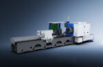 The דגם LYCK8463 is a large industrial CNC lathe featuring a metallic body, control panels, and a rotating chuck, set against a gradient blue background.