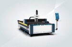 The דגם 3015N is a large industrial CNC laser cutting machine featuring a digital control panel and safety enclosures, showcased in a well-lit studio with a light gradient background.